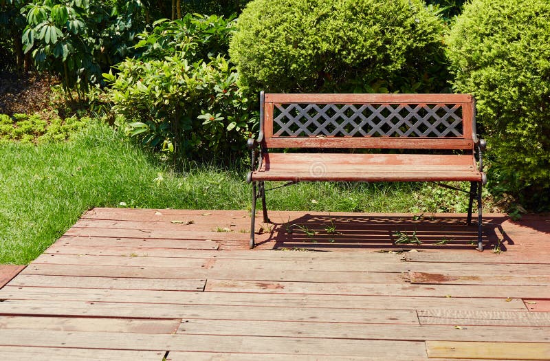 Chair on wooden deck wood outdoor patio backyard garden stock photography Chair on wooden deck wood outdoor patio backyard garden stock photography