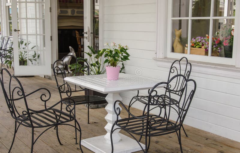 Chair in front of the house.