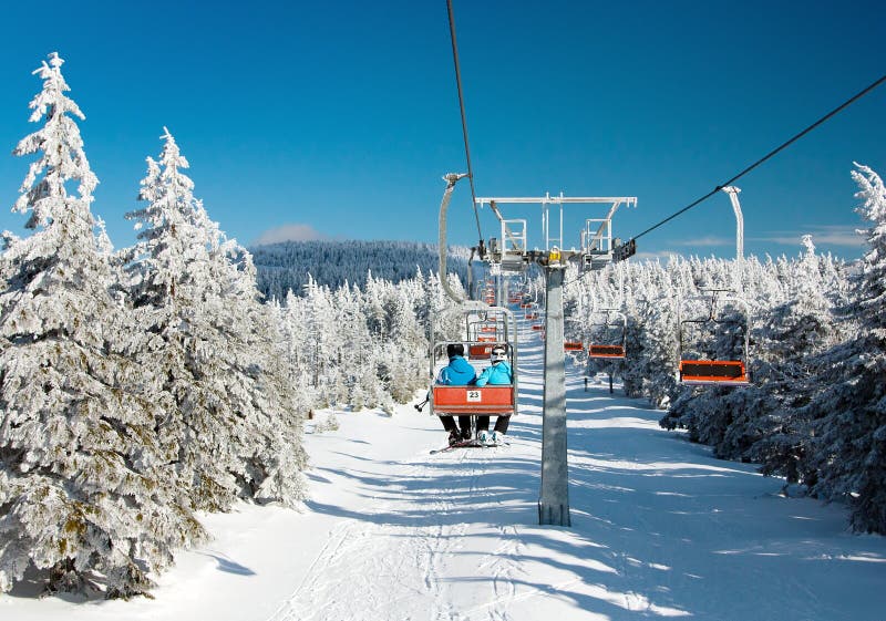 Chair lift on mountain stock photo. Image of recreation 29941130