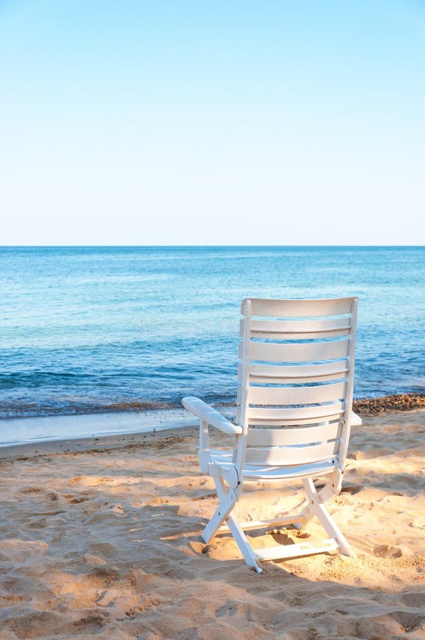 Chair on sand beach.