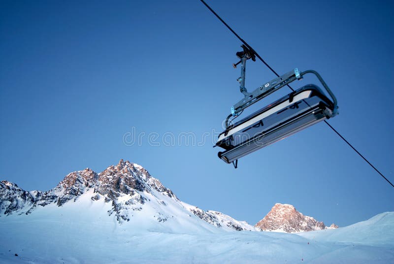Chairlift and mountain stock photo. Image of skier, morning 4427556