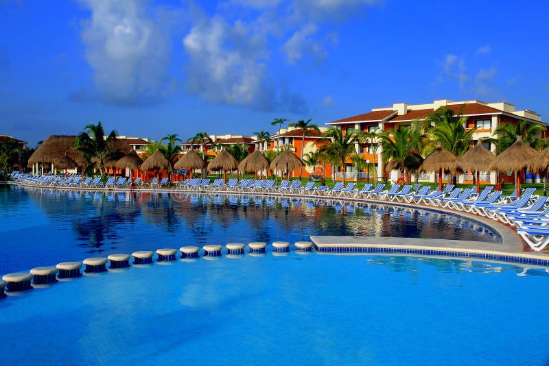 Chairs around the swimming pool