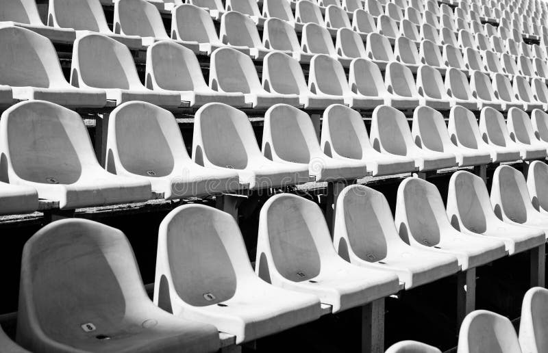 Tribune sports stadium with empty chairs Stock Photo - Alamy