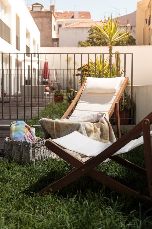 Chairs in balcony stock image. Image of bedding, home 76886253