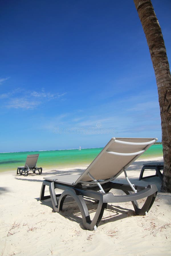 Chaise longue on beach stock image. Image of sand, beach 17995553