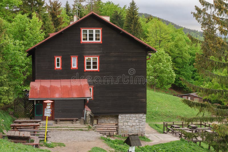 Chalet under mountain Suchy Vrch, national park Mala Fatra, Slovakia, spring sunset time