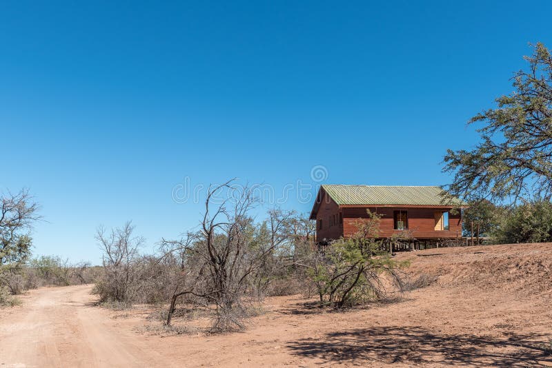 BEAUFORT WEST, SOUTH AFRICA - APRIL 3, 2021: A chalet at Steenbokkie Nature Reserve near Beaufort West in the Western Cape Karoo. BEAUFORT WEST, SOUTH AFRICA - APRIL 3, 2021: A chalet at Steenbokkie Nature Reserve near Beaufort West in the Western Cape Karoo