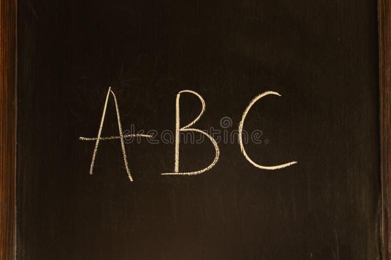 Wooden table, blackboard, chalk, sponge, table, wood, board, blackboard,  blackboard eraser, blackboard chalk, pieces of chalk, two, white, school  suply, letters, capital letters, abc, alphabet, learning, writing,  reflexion Stock Photo - Alamy