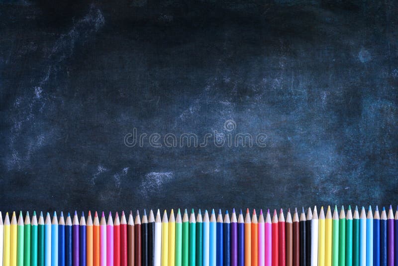 Chalkboard Texture Background with Colored Pencils Stock Photo Image