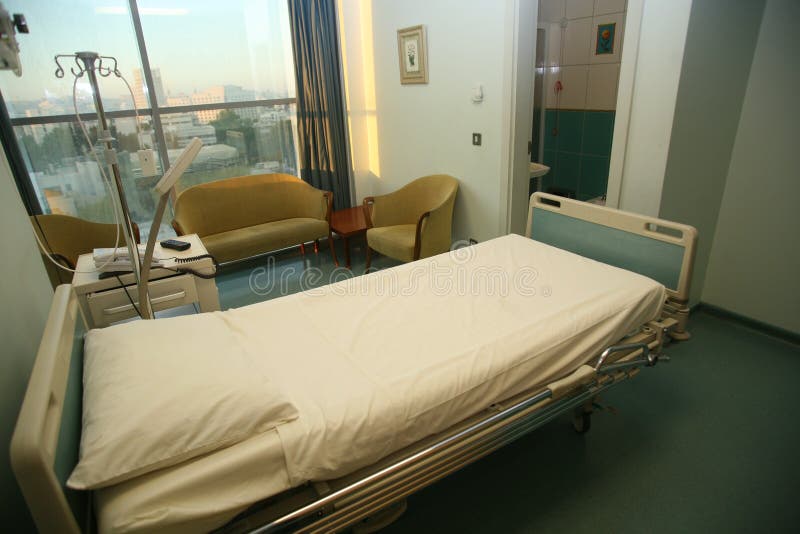 Picture of a hospitals bedroom with lighting. Picture of a hospitals bedroom with lighting