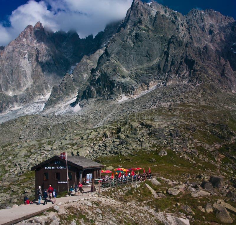 Alpine view of a bar and shelter near Chamonix, France. Seen from middle way station between Chamonix and Aiguille du Midi peak. Alpine view of a bar and shelter near Chamonix, France. Seen from middle way station between Chamonix and Aiguille du Midi peak.