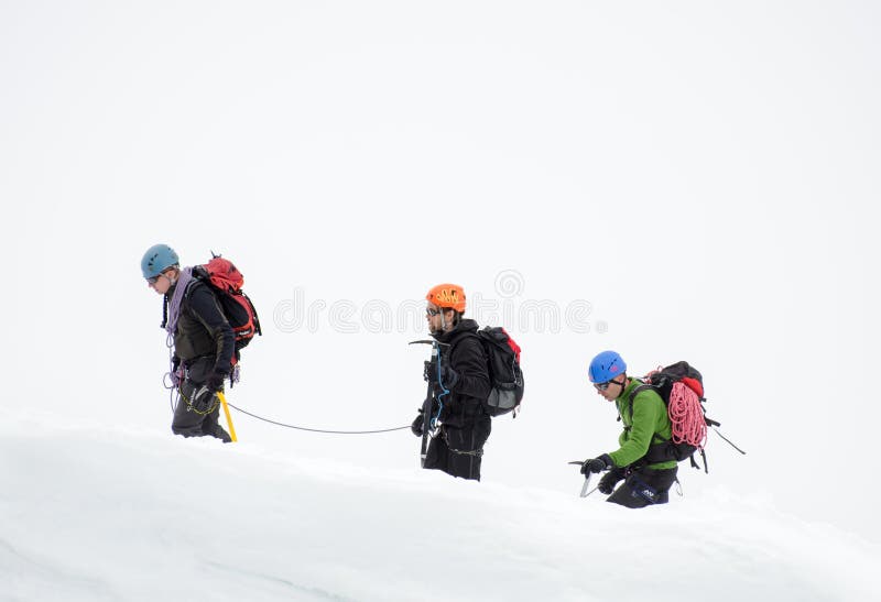 CHAMONIX, FRANCE - JUNE 8, 2013: Climbers in the French Alps mountains. Mont Blanc massif, Aiguille du Midi. Chamonix