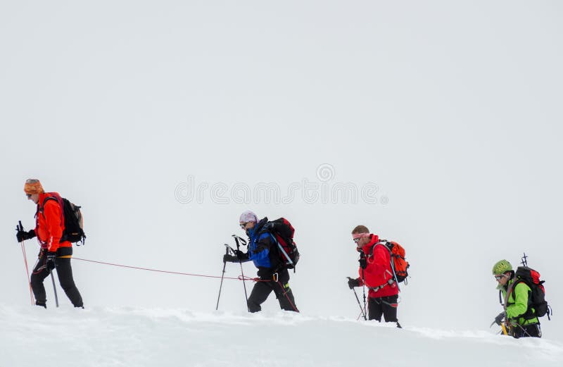 CHAMONIX, FRANCE - JUNE 8, 2013: Climbers in the French Alps mountains. Mont Blanc massif, Aiguille du Midi. Chamonix