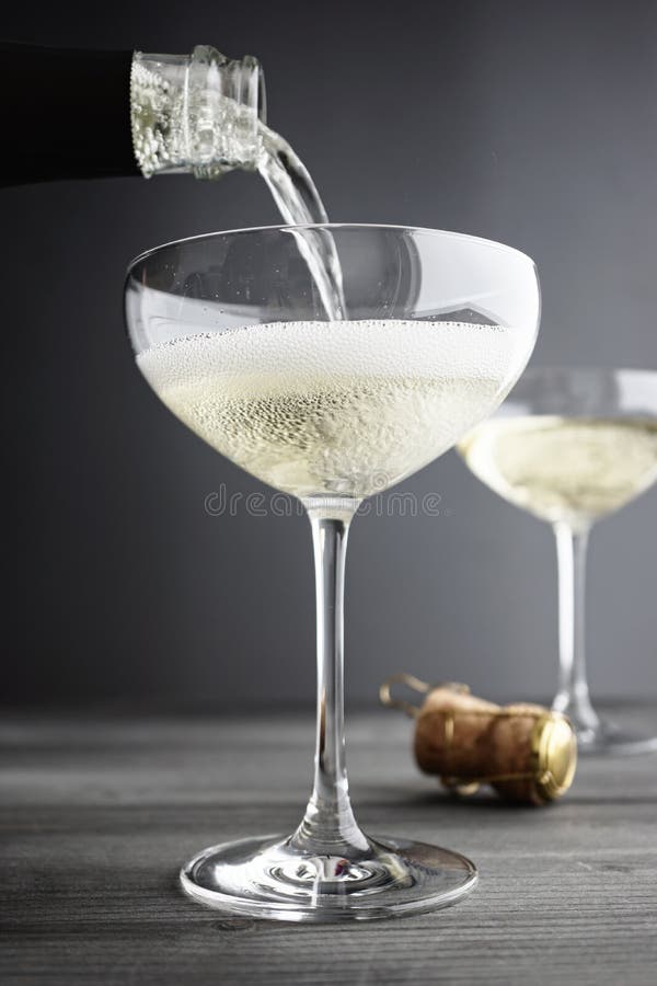 Champagne Being Filled in Coupe Glasses Stock Photo Image of wine