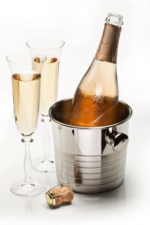 Champagne Bottle in Cooler and in Glasses. Stock Photo Image of