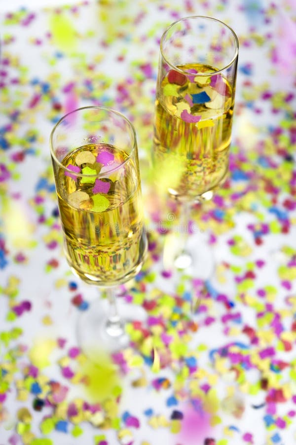Champagne and confetti stock image. Image of birthday 21507373
