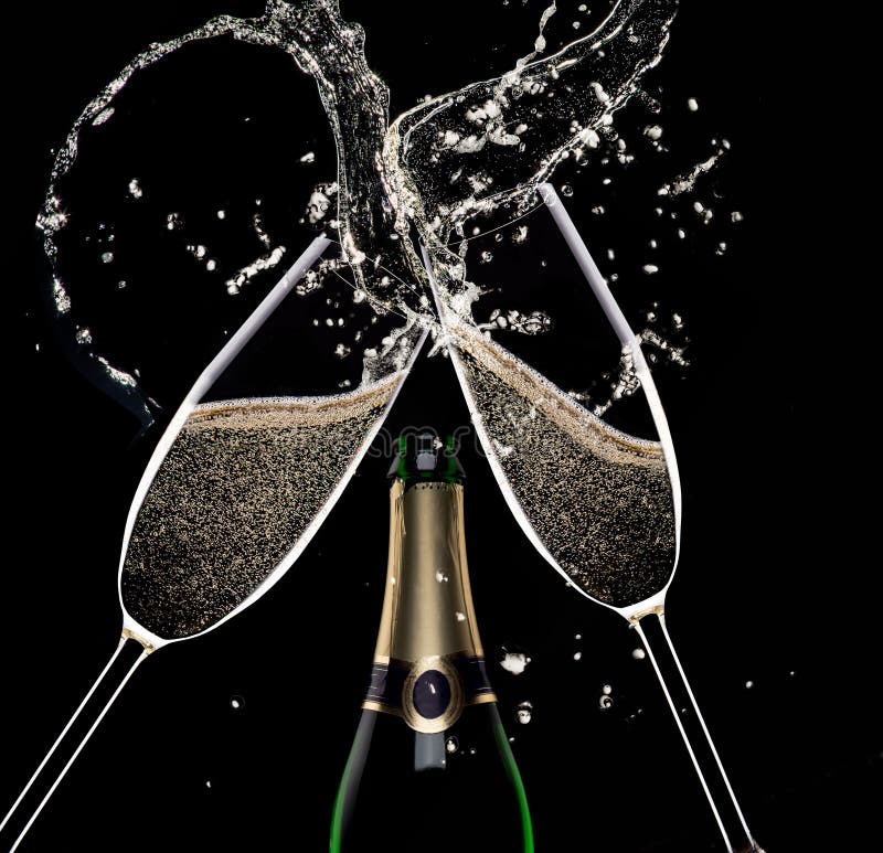 Champagne flutes on black background, celebration theme. Champagne flutes on black background, celebration theme.