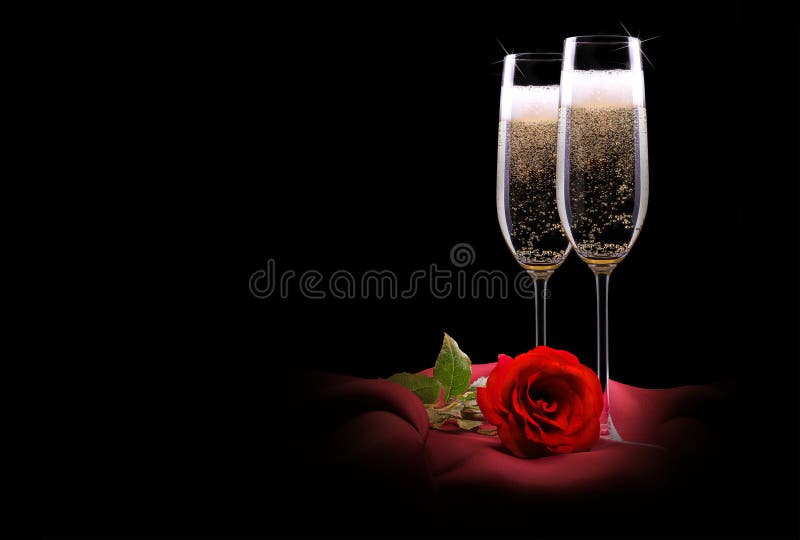 Luxury champagne glass with red silk and flower on black background. Luxury champagne glass with red silk and flower on black background