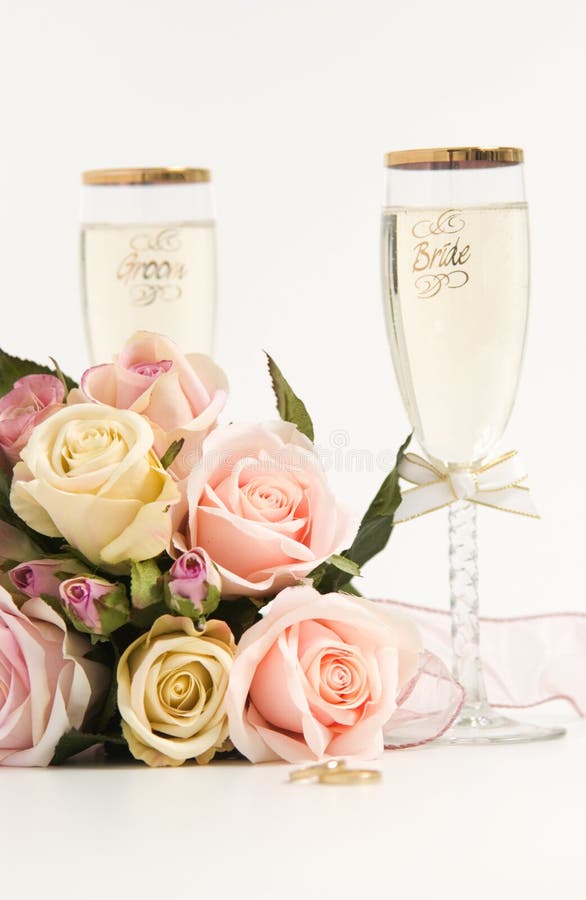 Wedding Bridal Bouquet of White Roses on Pink Background with Pair of