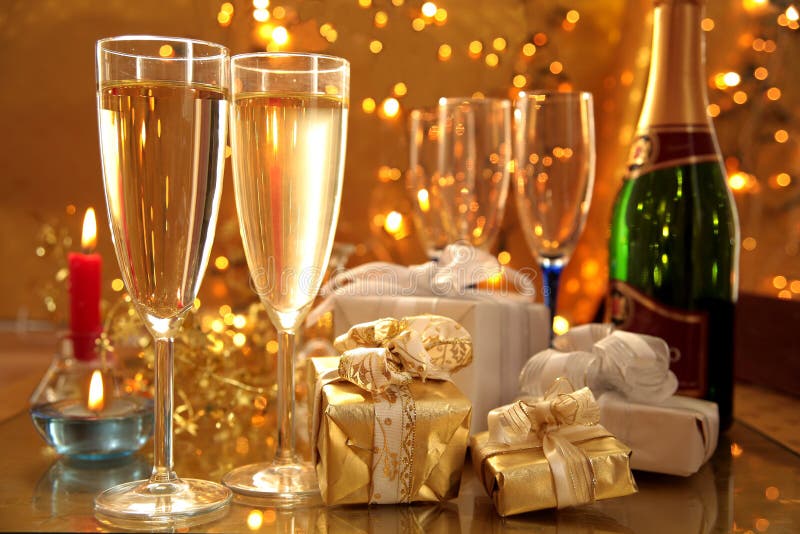 Champagne in glasses,gifts and lights