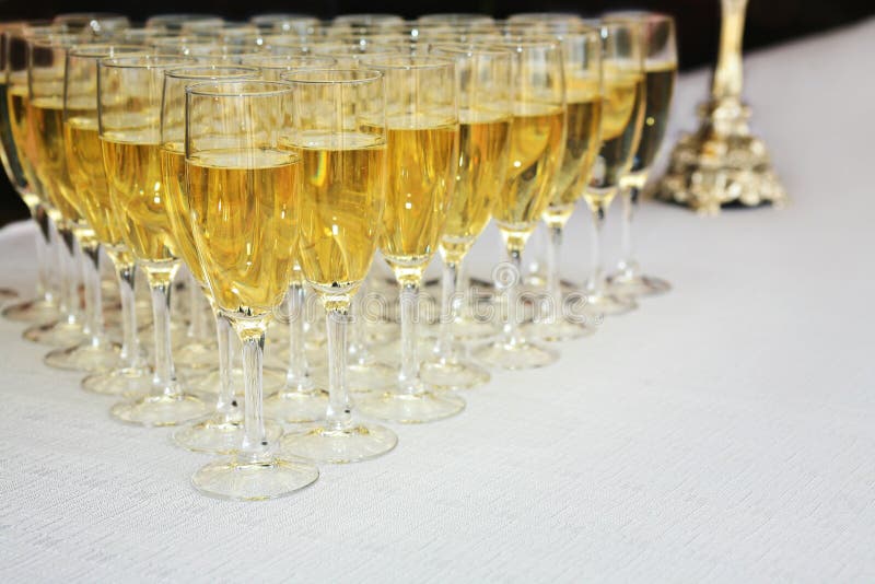 Champagne glasses on table stock photo. Image of champagne 23095646