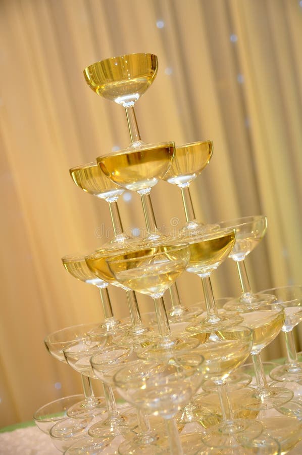 Champagne glasses tower stock photo. Image of background 16343098