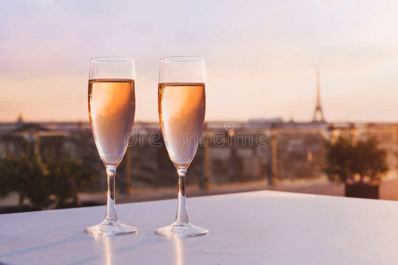 Champagne in restaurant with view of Eiffel Tower in Paris