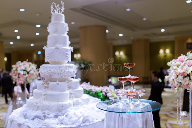 Champagne tower and in wedding cake.