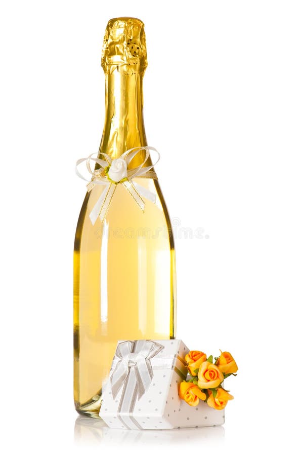 Champagne with wedding decor and present