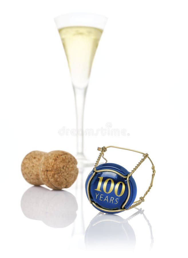 A champagne cap with the inscription 100 years. A champagne cap with the inscription 100 years
