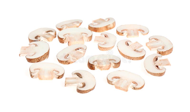 Cut champignon mushrooms isolated on white. Layer for pizza. Cut champignon mushrooms isolated on white. Layer for pizza