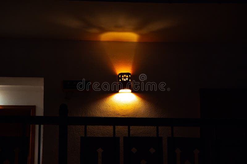 Chandelier on the Wall in a Dark Room Indoors Stock Image Image of
