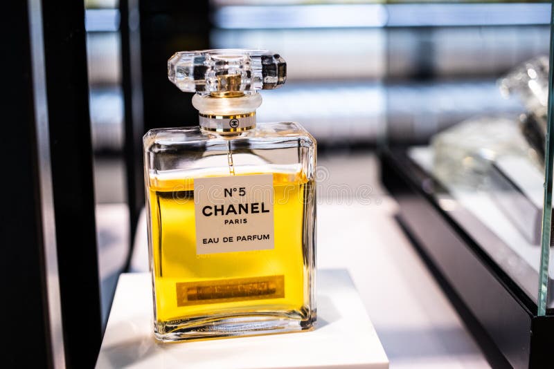 Glass golden bottles of NO5 Chanel perfume Is the first perfume launched  by French couturier Gabrielle Coco Chanel Stock Photo  Alamy