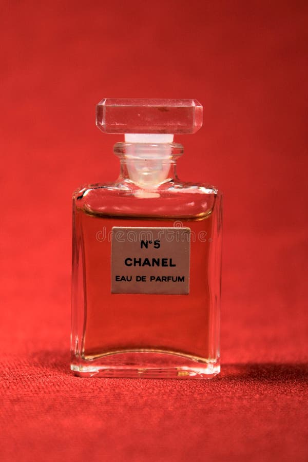 Chanel Perfume Bottle Isolated on Red & Blue Background. Bottle with Coco Chanel  Perfume Product. Editorial Image - Image of abstract, fragrance: 182869665