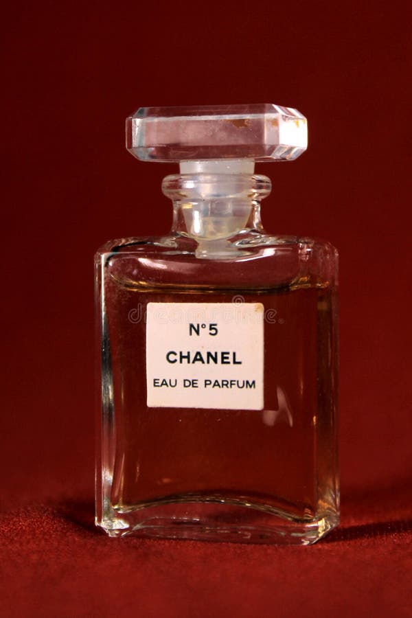 Chanel Perfume Bottle Isolated on Red & Blue Background. Bottle with Coco  Chanel Perfume Product Editorial Stock Photo - Image of female, bottles:  182869533