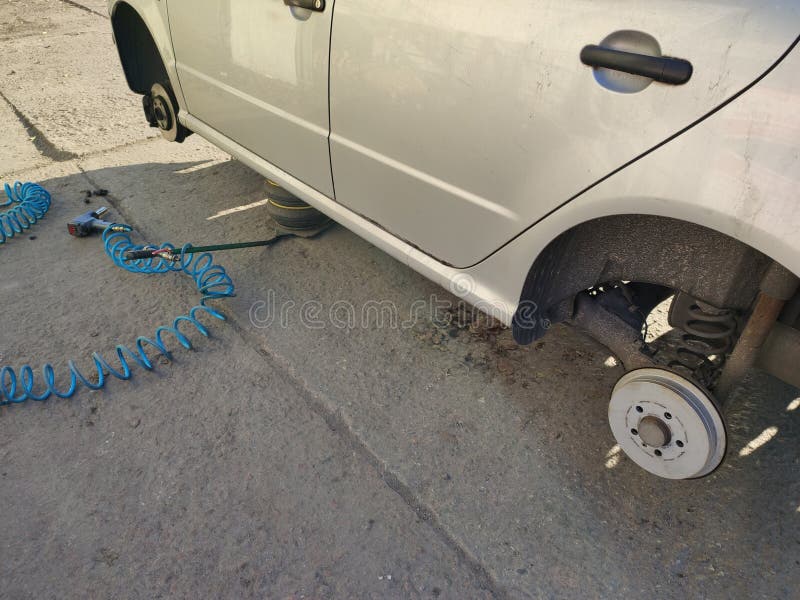Change of Wheels for the Car in the Spring Stock Photo Image of lever