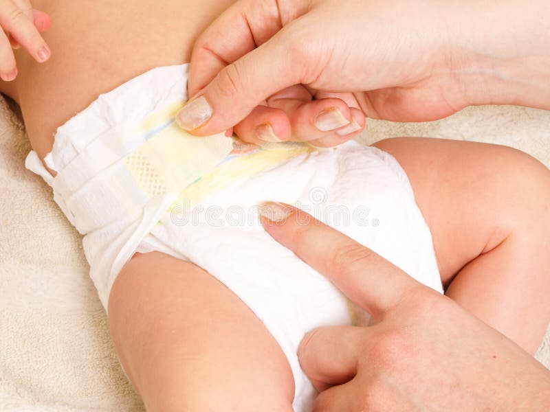 Changement de couche-culotte photo stock Changement de couche-culotte photo stock