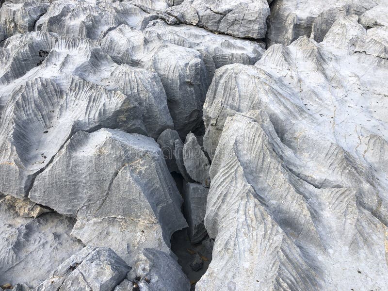 Changes, sharpness, formations, crevices, corrugated and sharp structures in stones. Changes and formations in limestones in high mountains in the Mediterranean region -Antalya-Türkiye