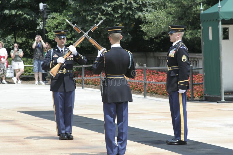 This is the Changing of the Guard Ceremony at Arllington National Cemetery in VA on August 1, 2007. These are the men guarding the Tomb of the Unknown Soldier. This is the Changing of the Guard Ceremony at Arllington National Cemetery in VA on August 1, 2007. These are the men guarding the Tomb of the Unknown Soldier.