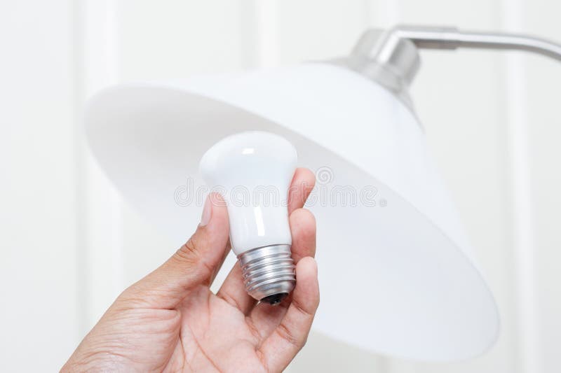 Changing light bulb.