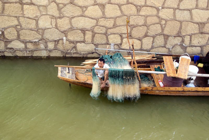 Changsha china: fishing boat under the bridge