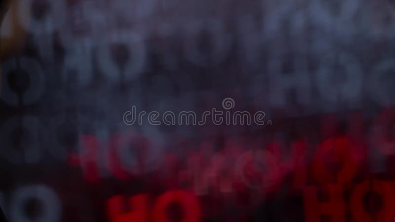 Chaotische bewegliche Partikel buntes unscharfes bokeh beleuchtet Hintergrundaufschrift ho ho ho stock video footage