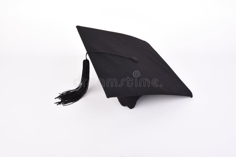 Chapeau d'obtention du diplôme avec le gland arrière d'isolement sur l'esprit blanc de fond photographie stock Chapeau d'obtention du diplôme avec le gland arrière d'isolement sur l'esprit blanc de fond photographie stock