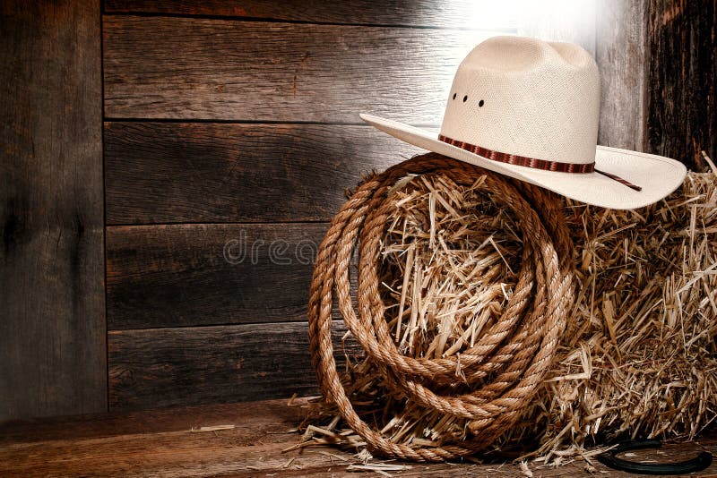Chapéu de palha ocidental americano do cowboy do rodeio na bala de feno