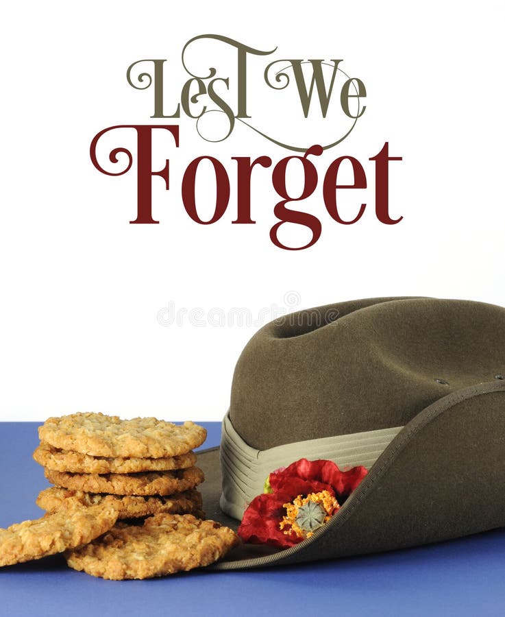 Australian army slouch hat and traditional Anzac biscuits on white and blue background for Anzac Day, April 25, or Remembrance Armistice Day, November 11, with Lest We Forget sample text. Australian army slouch hat and traditional Anzac biscuits on white and blue background for Anzac Day, April 25, or Remembrance Armistice Day, November 11, with Lest We Forget sample text.