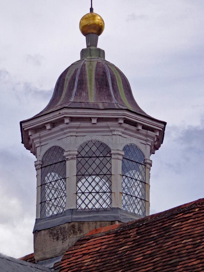 Characteristic lovely small English tower at the roof of and old mansion stock image Characteristic lovely small English tower at the roof of and old mansion stock image