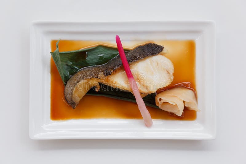 Charbonniers de Teriyaki : Fried Marinated Sable Fish avec de la sauce à Teriyaki images stock Charbonniers de Teriyaki : Fried Marinated Sable Fish avec de la sauce à Teriyaki images stock