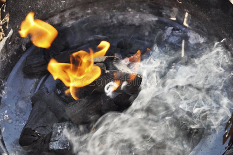 Charcoal Burning in a Barbecue Grill. Stock Photo Image of food