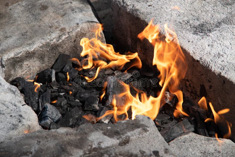 Charcoal Burning in the Grill. the Fire in the Grill. Kindle Fire