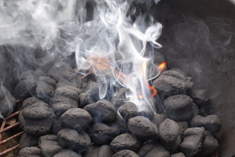 Charcoal burning stock photo. Image of burning, smoky 45166308
